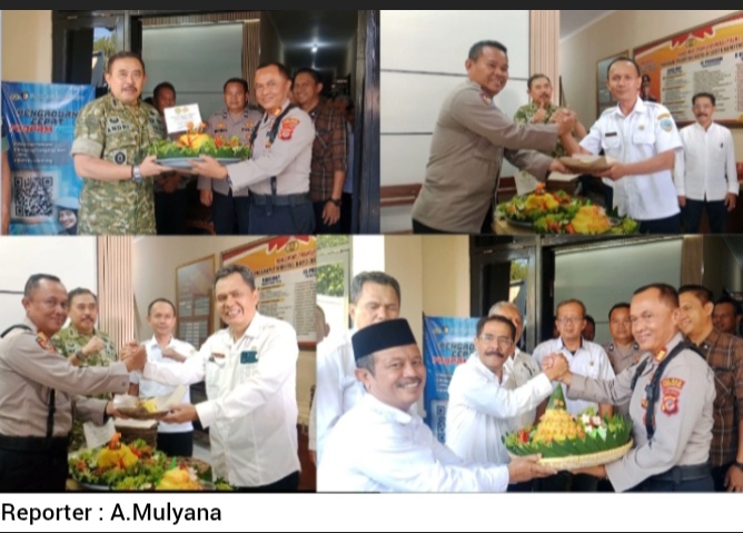 Prokopimcam Dua Kecamatan Berikan Kejutan Tumpeng Ke Polsek Cibeureum di Hari Bhayangkara Ke-80